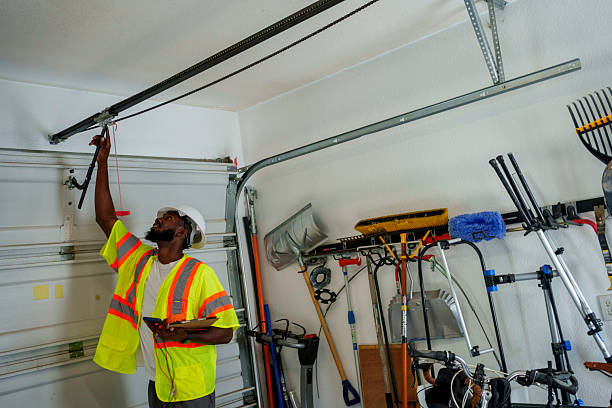 Professional Garage Door Panel Replacement technician working in Garden City South, NY